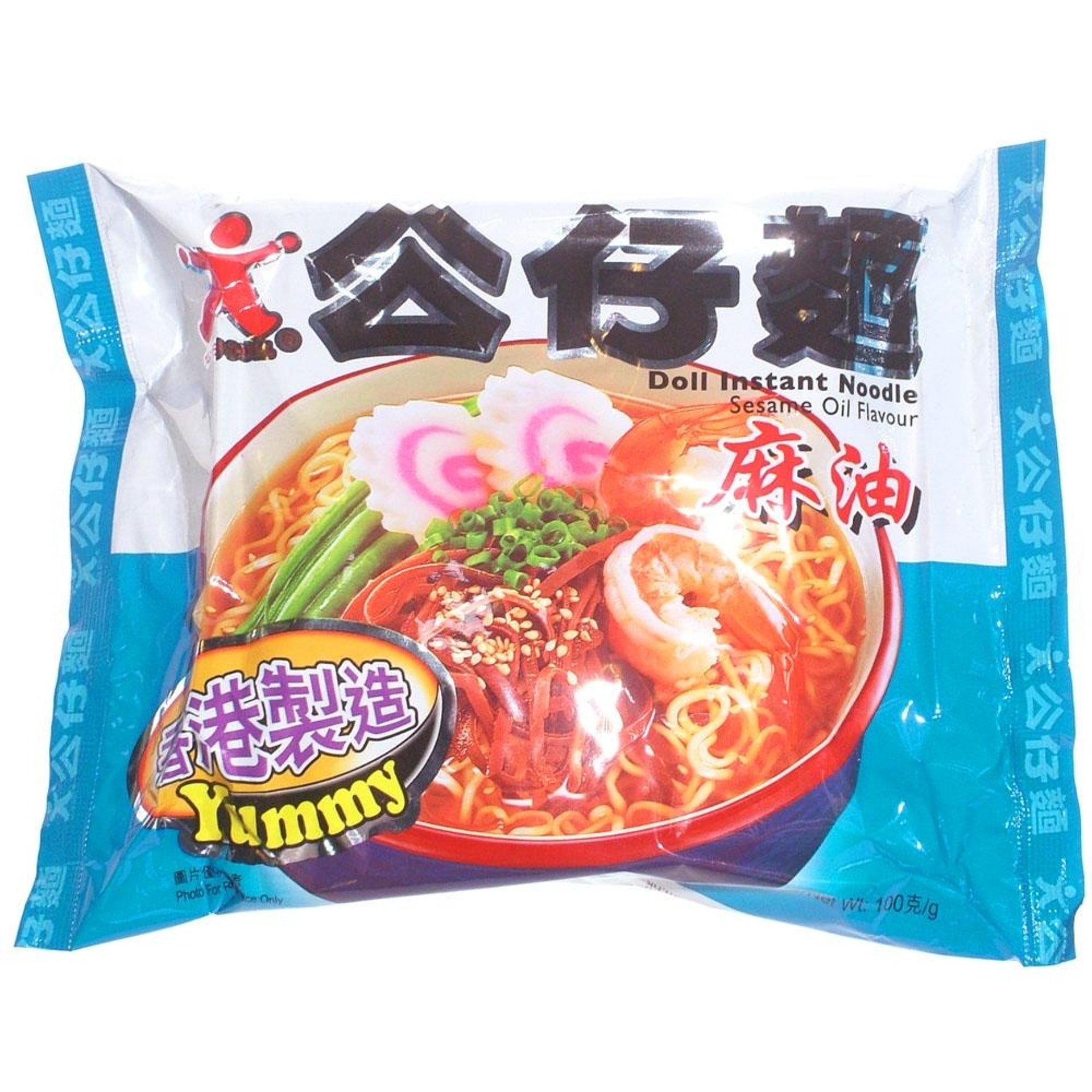 a packet of instant noodles labelled "doll instant noodle sesame flavour". The large black chinese text says "Doll Noodle", the red one says "Sesame Oil" and the purple one says "Made in Hong Kong".