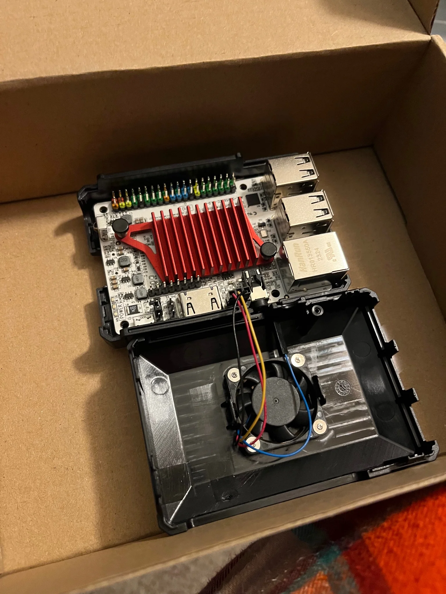 libre computers le potato as seen from inside a plastic enclosure 